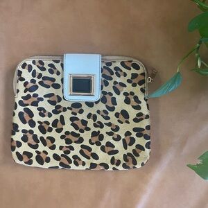White, black and leopard print cowhide fur clutch.